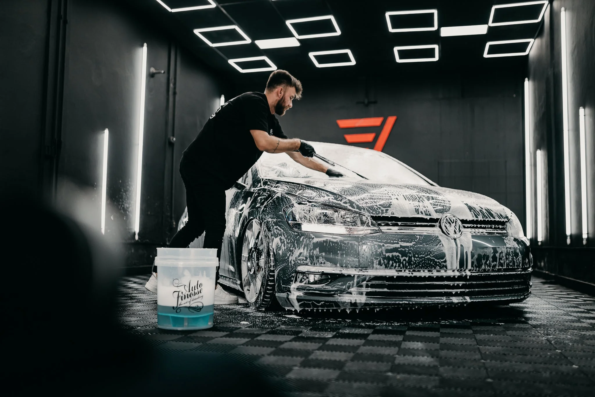 Freshly cleaned vehicle with gleaming wheels and carefully finished exterior details